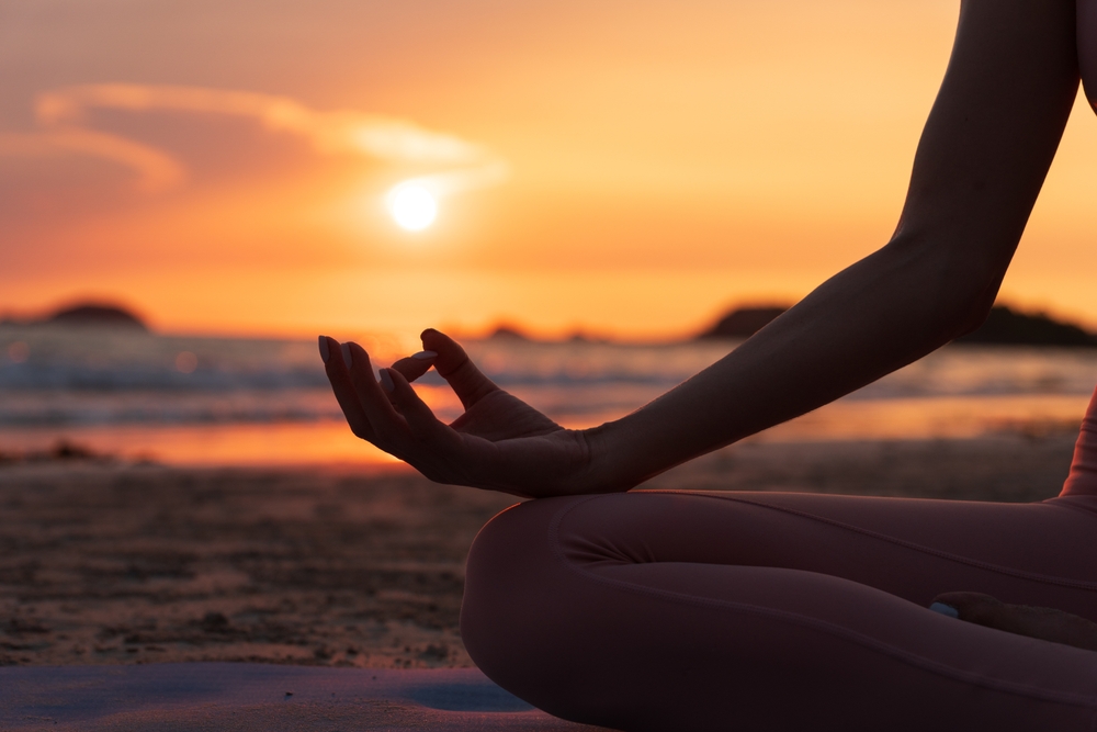 Evening yoga and meditation at sunset for stress relief